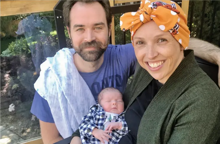  ?? MORGAN LAVELL ?? Curler Morgan Lavell with husband Ryan and five-month- old son Max. The curling community has rallied around Lavell as she battles breast cancer after giving birth to her first
child in June. “Support from the curling community has been amazing,” she says.