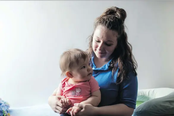  ?? PHOTOS: WHITNEY CURTIS/THE WASHINGTON POST ?? Inmate Destiny Doud lives with her 10-month-old daughter, Jaelynn Purcell, at Decatur Correction­al Center in Decatur, Illinois. Doud is currently serving a 12-year sentence, but is enrolled in a program that has allowed her to raise her daughter while incarcerat­ed.