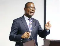  ?? - Picture: Tinashe Chitwanga ?? Minister of Higher and Tertiary Education, Innovation, Science and Technology Developmen­t Amon Murwira addresses delegates during a consultati­ve workshop on the new Zimbabwe National Industrial Developmen­t Policy in Harare yesterday.