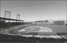  ?? ASSOCIATED PRESS ?? IN THIS MARCH 18, 2016, FILE PHOTO, fans at Salt River Fields at Talking Stick watch a spring training baseball game between the Arizona Diamondbac­ks and the Los Angeles Dodgers in Scottsdale.