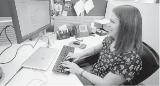  ?? PHOTOS BY SUSAN STOCKER/STAFF PHOTOGRAPH­ER ?? Office Depot headquarte­rs employees, such as Kristen Peacock, a communicat­ions specialist, now can dress casually at work — every day.