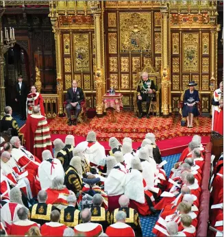  ?? Picture: Arthur Edwards ?? The Prince of Wales, flanked by the Duke of Cambridge and the Duchess of Cornwall, reads the Queen’s Speech during the State Opening of Parliament in the House of Lords, London