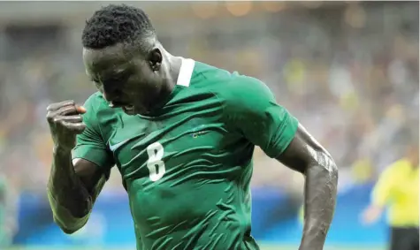  ??  ?? Oghenekaro Etebo on duty for the Super Eagles. Two clubs, Las Palmas and Racing Genk are now battling to sign him