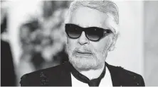  ?? Valery Hache / AFP / Tribune News Service ?? Fashion designer Karl Lagerfeld, whose death was announced by Chanel, was known as the “kaiser” and “soul” of fashion.