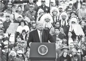  ?? JANIE OSBORNE/ASSOCIATED PRESS ?? President Donald Trump speaks during a campaign rally Saturday at Bozeman Yellowston­e Internatio­nal Airport in Belgrade, Mont.