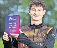  ?? ?? MAN OF THE MONTH
Harkes shows off his award yesterday