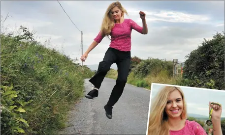  ?? Photos by Declan Malone ?? Victoria Breathnach demonstrat­es her winning sean nós dancing style on the road outside her home in Gorta Dúbha and (inset) Victoria holds a piece of history - her senior sean nós dancing medal from Fleadh Cheoil na Mumhan.