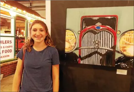  ?? REBECCA BLANCHARD — DIGITAL FIRST MEDIA ?? Emily Zimmerman, a senior at Boyertown Senior High School, with her museum-inspired art work. These works will be on display at the museum until Monday, and will then be moved to Studio B.