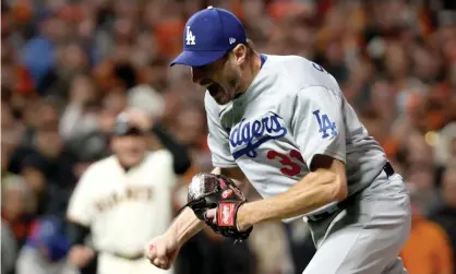  ?? Harry How/Getty Images ?? Los Angeles Dodgers starting pitcher Max Scherzer celebrates after defeating the San Francisco Giants in Game 5 of the NLDS. Photograph: