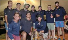  ?? Pictures: MARK CARRELS ?? SWEET SUCCESS: Brandon Handley and his Cuylervill­e team celebrate with the Pineapple Cricket Week trophy after winning the A section final against Sidbury on Saturday at the PAHS school fields.