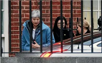  ?? GETTY IMAGES ?? British Prime Minister Theresa May leaves 10 Downing St after writing to European Council President Donald Tusk requesting a Brexit delay until June 30.