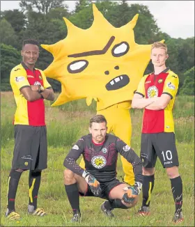  ??  ?? STRIKE A POSE: Left to right: Partick Thistle’s Abdul Osman, Tomas Cerny and Chris Erskine model the Firhill club’s new home kit alongside mascot Kingsley.