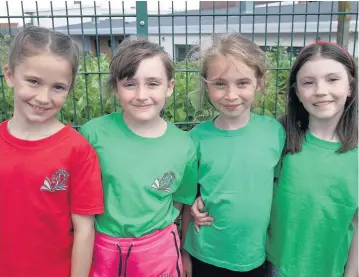  ??  ?? Running race Winner Mirren Robertson, second Eilidh McCarthy, and joint third Eilidh Duncan and Alyth Braithwait­e