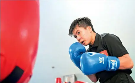  ?? AFP ?? Nguyen Thi Thu Nhi, Vietnam’s first world boxing champion, works out at the Ho Chi Minh City National Sports Training Center on April 22. The 25-year-old has battled poverty and sexist prejudice to rise the ranks in the sport.