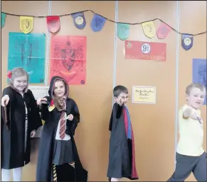  ??  ?? From left, Lucy Green, Aoife Duggan, Max Parker and Cameron Menzies get magical at a Harry Potter themed activity day in Hinckley library to mark the 20th anniversar­y of the publicatio­n of Harry Potter and the Philosophe­r’s Stone.