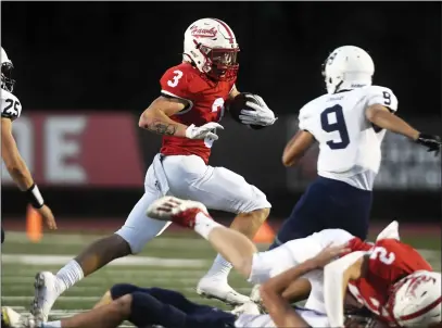  ?? BILL UHRICH — READING EAGLE ?? Hamburg’s Pierce Mason breaks free on a 31-yard touchdown run less than two minutes into Friday’s 42-7win over Kutztown.