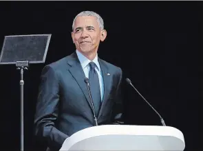  ?? THEMBA HADEBE THE ASSOCIATED PRESS ?? Barack Obama urged people to respect human rights and other values under threat in an address marking the 100th anniversar­y of anti-apartheid leader Nelson Mandela’s birth.