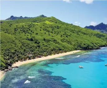  ??  ?? An aerial view of a beach in Yasawas.