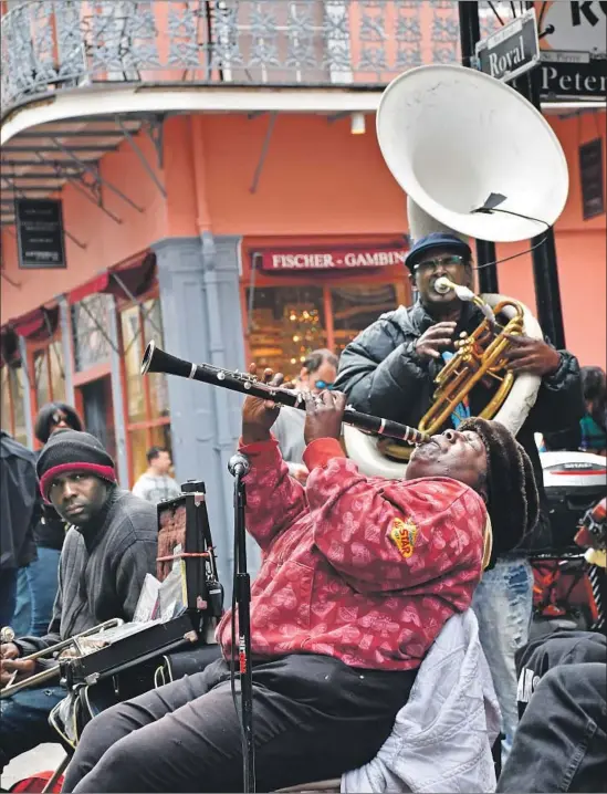  ?? Doreen Ketchens on clarinet and her band, on Royal Street. Christophe­r Reynolds Los Angeles Times ??