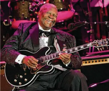  ?? Associated Press file photo ?? B.B. King performs on his black Gibson ES-345 prototype guitar in 2008 in Los Angeles. Daniel de Visé’s book lends context to what made the bluesman a legend.