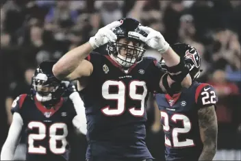  ?? ASSOCIATED PRESS ?? HOUSTON TEXANS DEFENSIVE END J.J. WATT (99) celebrates during the second half of an NFL wild-card playoff game against the Buffalo Bills in Houston in this Jan. 4, 2020, file photo.