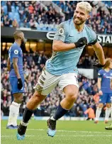  ?? — AFP ?? Manchester City’s Sergio Aguero celebrates after scoring against Chelsea in Manchester on Sunday. The hosts won 6-0.