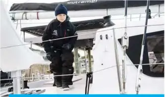  ??  ?? HAMPTON: Swedish climate activist Greta Thunberg walks aboard the catamaran La Vagabonde as she sets sail to Europe in Hampton, Virginia. —AFP