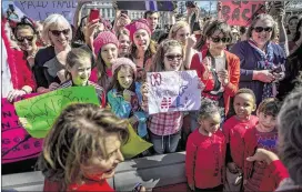  ?? GABRIELLA DEMCZUK / THE NEW YORK TIMES ?? A crowd outside the Capitol in Washington, D.C., listens Wednesday to lawmakers speaking about Internatio­nal Women’s Day.