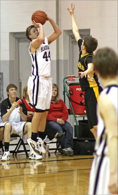  ?? Photograph­s courtesy of Russ Wilson ?? Blackhawk junior Jacob Hall’s 3-pointers cinched the Colors Day game Friday night against the Prairie Grove Tigers. Hall scored a game high of 26 points.