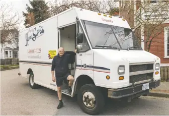  ?? ARLEN REDEKOP ?? Mike Bryan, seen with his 2000 Freightlin­er van, has been a milkman since 1995, when he purchased a route from Dairyland. The company, now owned by Saputo, is ending delivery service this month.