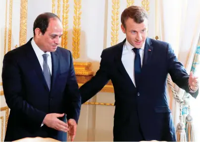  ??  ?? French President Emmanuel Macron and Egypt’s President Abdel Fattah El-Sisi at the Elysee Palace in Paris on Tuesday. (AFP)