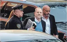  ?? ANDRES KUDACKI
THE ASSOCIATED PRESS ?? Harvey Weinstein arrives at a police station in NYC to turn himself in to authoritie­s over numerous allegation­s of sexual misconduct.