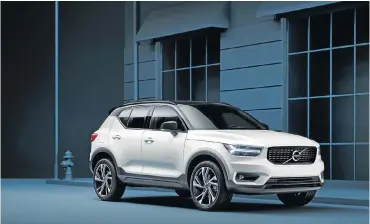  ??  ?? The XC40 adopts Volvo’s new styling language with its own appealing twist. Right: The R-Design version wears 19-inch diamond-cut wheels.