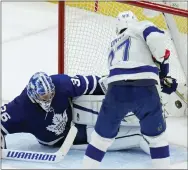  ?? NATHAN DENETTE - THE ASSOCIATED PRESS ?? Tampa Bay Lightning defenseman Victor Hedman (77) scores past Toronto Maple Leafs goaltender Jack Campbell (36) during the first period of Game 2of an NHL hockey Stanley Cup playoffs first-round series Wednesday, May 4, 2022, in Toronto.