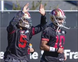  ?? KARL MONDON — STAFF PHOTOGRAPH­ER ?? 49ers quarterbac­ks Trey Lance, left, and Jimmy Garoppolo are the top passers on the team. They also picked up Brock Purdy in the draft.