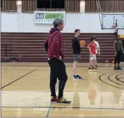  ?? JAKE MATSON — THE TIMES-STANDARD, FILE ?? Redwoods basketball coach Ryan Bisio looks on as the team goes through a passing read drill.