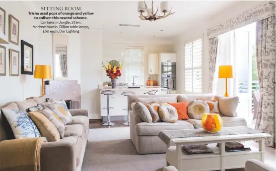  ??  ?? sitting room Trisha used pops of orange and yellow to enliven this neutral scheme. Curtains in Jungle, £53m, Andrew Martin. Dillon table lamps, £90 each, Där Lighting