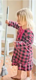  ??  ?? LITTLE HELPER: It’s never too early to teach children to do household chores, experts say.