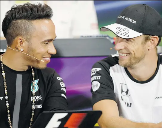  ?? — THE ASSOCIATED PRESS ?? Formula One champ Lewis Hamilton of Britain, left, signed a three-year deal with Mercedes Wednesday. Hamilton will compete with McLaren driver and fellow Brit Jenson Button, right, during this weekend’s Monaco Grand Prix.