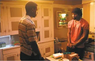  ?? Michael Yarish / FX ?? Damson Idris (left) plays Franklin Saint, who tells a drug lord he can sell a kilo of cocaine overnight, and Amin Joseph plays Jerome in “Snowfall.”