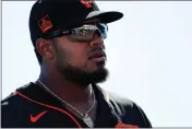  ??  ?? The Giants’ Heliot Ramos walks back to the dugout during the fifth inning of a Cactus League game against the White Sox at Camelback Ranch in Phoenix on Feb. 25. Ramos is ranked as the Giants’ No. 3 prospect by MLB.com.