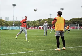  ??  ?? Shanghai Port striker Marko Arnautovic takes part in a training session with his Chinese Super League teammates at Pudong’s Century Park. — Ti Gong