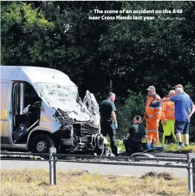  ?? Jonathan Myers ?? > The scene of an accident on the A48 near Cross Hands last year