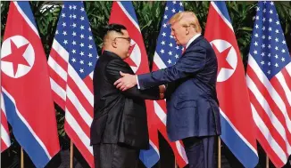  ?? THE STRAITS TIMES / XINHUA / ZUMA PRESS / TNS ?? Public perception­s of the June 12 meeting between North Korean leader Kim Jong Un and U.S. President Donald Trump are more guarded than those of the leaders.