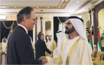  ?? Ryan Carter / Crown Prince Court – Abu Dhabi ?? Sheikh Mohammed bin Rashid, Vice President and Ruler of Dubai, in 2015 with the British envoy Philip Parham, who is leaving Abu Dhabi