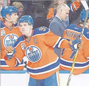  ?? CP PHOTO ?? Edmonton Oilers’ Connor McDavid celebrates a goal against the Detroit Red Wings during first period NHL action in Edmonton, Alta. on March 4.