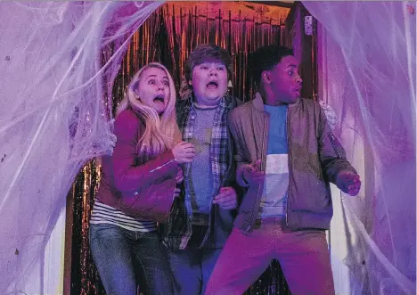  ?? COLUMBIA PICTURES ?? Madison Iseman, left, Jeremy Ray Taylor and Caleel Harris must conquer an evil plan to bring Halloween decoration­s to life.