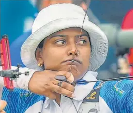  ?? PTI ?? Deepika Kumari takes aim during the women's recurve individual round in Jakarta on Thursday.