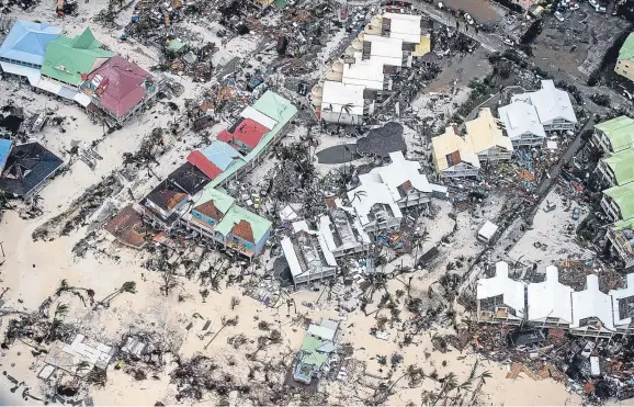  ??  ?? ■
This overhead shot shows the devastatin­g damage wreaked by Hurricane Irma in the island of St. Maarten in the Caribbean.