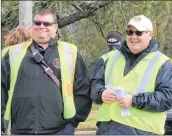  ??  ?? For details on the weekly fundraiser, visit: Windsor firefighte­rs Dave Mailman and Jonathan DeMont, who is the chairman of the toll road fundraiser and a past-president of the Windsor Rotary Club, were all smiles Oct. 20.